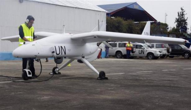 A technician checks a surveillance Unmanned Aerial Vehicles (UAV) drone operated by the United Nations in Goma